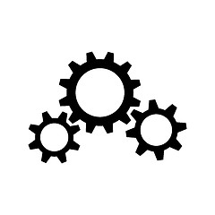 Image showing Three black gear wheels