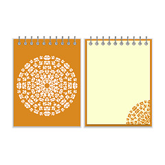 Image showing Orange cover notebook with round pattern