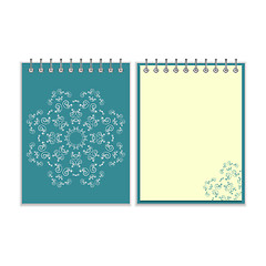 Image showing Blue cover notebook with round ornate star pattern