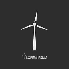 Image showing White wind turbine on dark grey