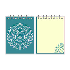 Image showing Blue cover notebook with round floral pattern