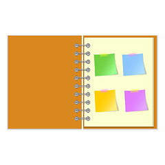Image showing Open notebook with stickers