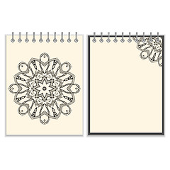 Image showing White cover notebook with handmade black pattern