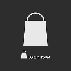 Image showing White shopping bag dark grey background