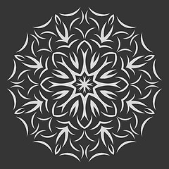 Image showing Round white  flower pattern on black background