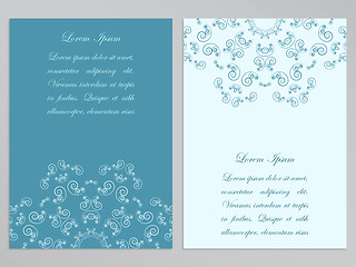 Image showing Blue and white flyers with ornate floral pattern