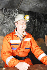 Image showing Smiling miner