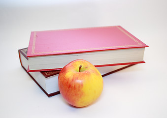 Image showing apple and two books