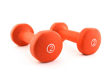 Image showing Orange dumbbells