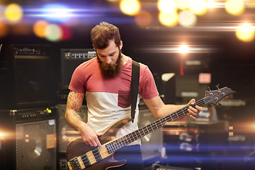 Image showing musician or customer with guitar at music store