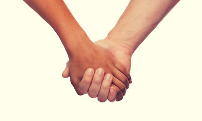 Image showing woman and man holding hands