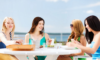 Image showing girls in cafe on the beach