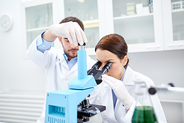 Image showing young scientists making test or research in lab