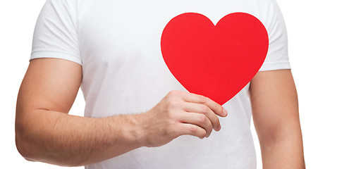 Image showing closeup of man hands with heart