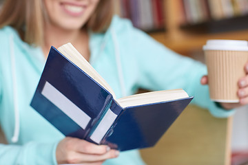 Image showing close up of student reading book at school