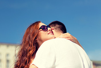 Image showing smiling couple in city