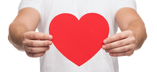 Image showing closeup of man hands with heart