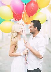 Image showing couple with colorful balloons