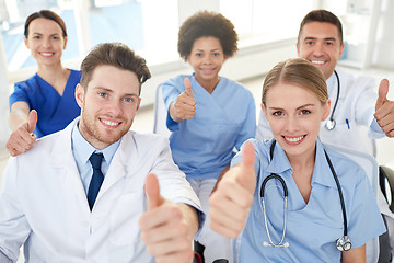 Image showing group of happy doctors on seminar at hospital