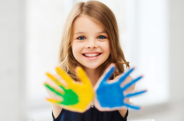 Image showing girl showing painted hands