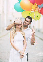 Image showing couple with colorful balloons