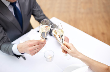 Image showing couple with glasses of champagne at restaurant