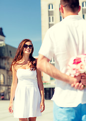 Image showing smiling couple in city