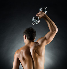 Image showing young man with dumbbell