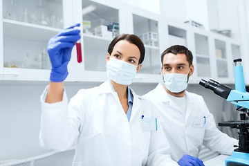 Image showing young scientists making test or research in lab