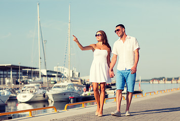 Image showing smiling couple in city