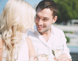 Image showing couple drinking wine in cafe