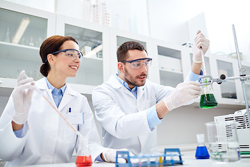 Image showing young scientists making test or research in lab