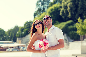 Image showing smiling couple in city