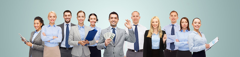 Image showing group of happy businesspeople with dollar money