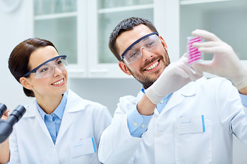 Image showing young scientists making test or research in lab