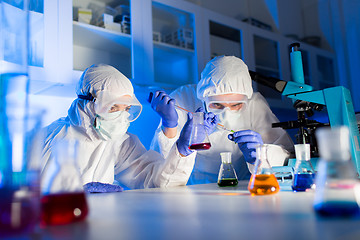 Image showing close up of scientists making test in lab