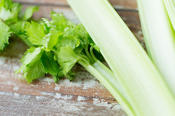 Image showing close up of celery stems on wooden table