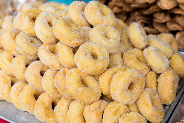 Image showing sugared donuts at asian street market