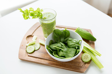 Image showing close up of fresh green juice glass and celery