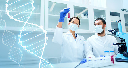 Image showing young scientists making test or research in lab