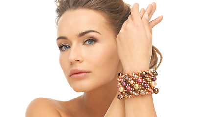 Image showing woman wearing bracelet with beads