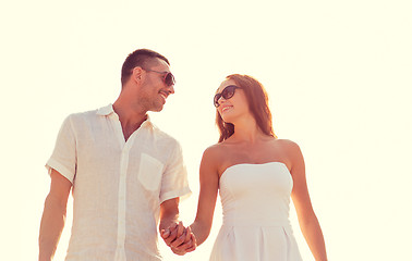 Image showing smiling couple in city