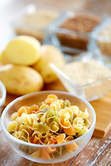 Image showing close up of pasta in glass bowls on table