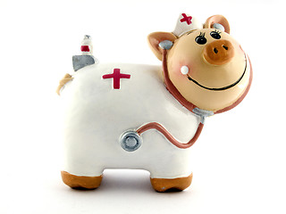 Image showing Souvenir - a toy a pig on a white background. isolated 2