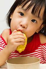 Image showing Chinese Girl Eating Durian