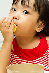 Image showing Chinese Girl Eating Durian
