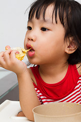 Image showing Chinese Girl Eating Durian