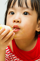 Image showing Chinese Girl Eating Durian