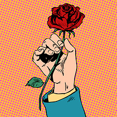 Image showing Flower red rose in his hand men love Bud art pop retro vintage