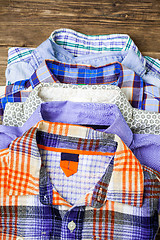 Image showing shirts in stack